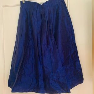 J Crew size 6 dark blue metallic skirt w/pockets, easy to pair with many pieces